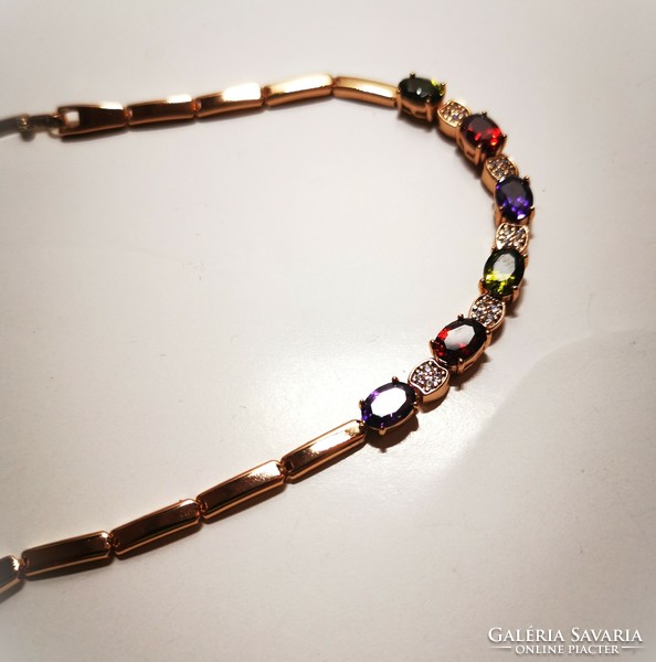 Aranyozott női karkötő, színes kristályokkal. Gold-plated women's bracelet with colorful crystals