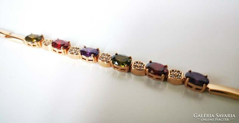 Gold-plated women's bracelet with colorful crystals. Gold-plated women's bracelet with colorful crystals