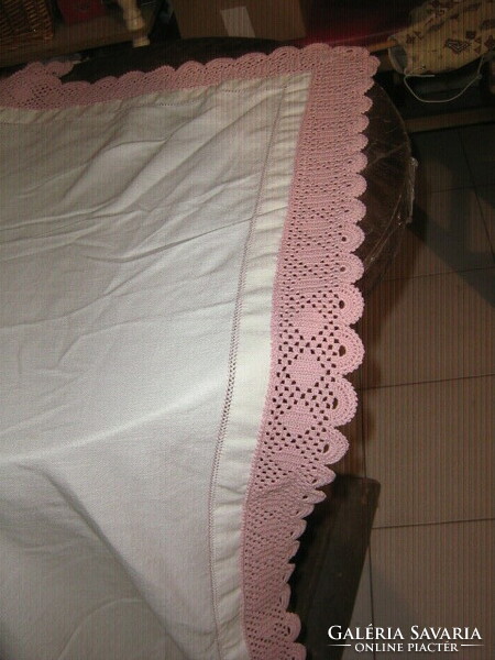 Beautiful azure woven tablecloth with hand-crocheted mauve pink wide lace