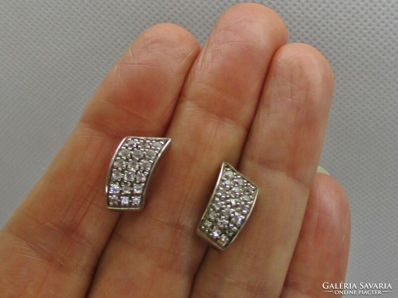 Elegant silver earrings with white stones