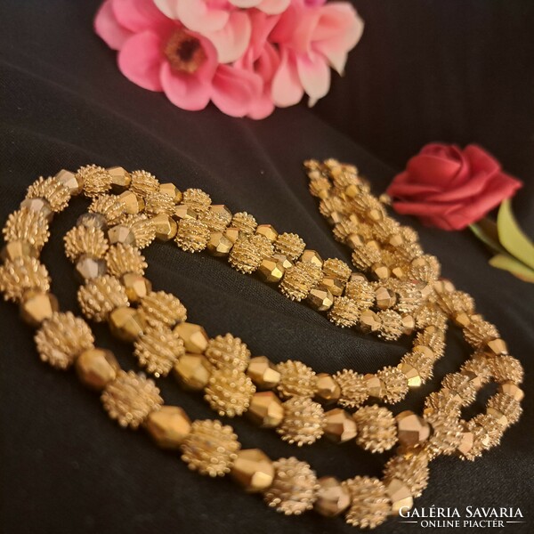 Gold-plated Israeli craftsman necklaces.