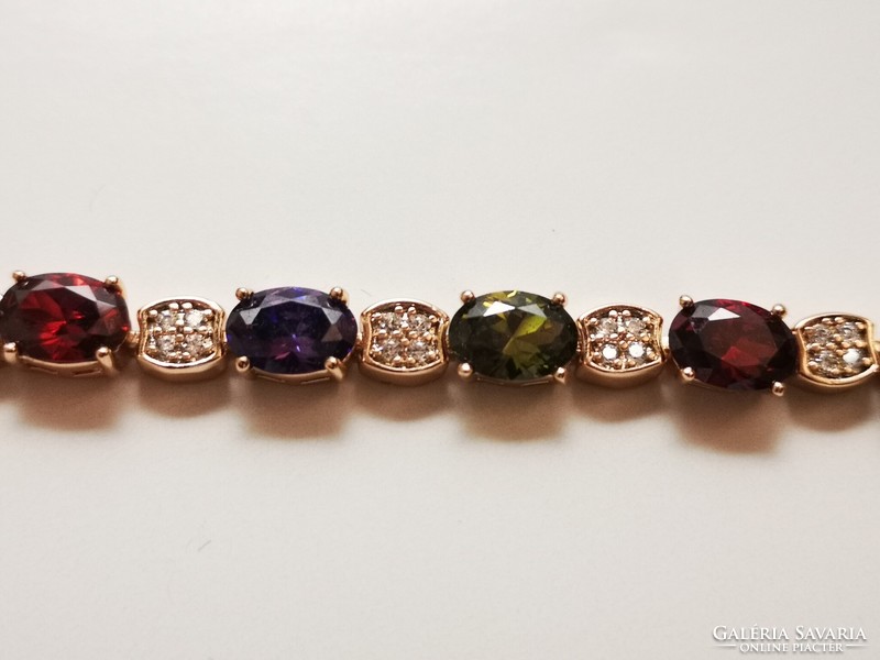 Gold-plated women's bracelet with colorful crystals. Gold-plated women's bracelet with colorful crystals