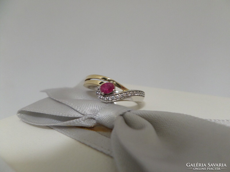 Gold ring with real ruby and tiny brilles