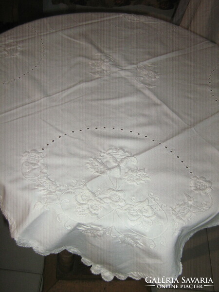 White embroidered tablecloth with a beautiful hand crocheted edge