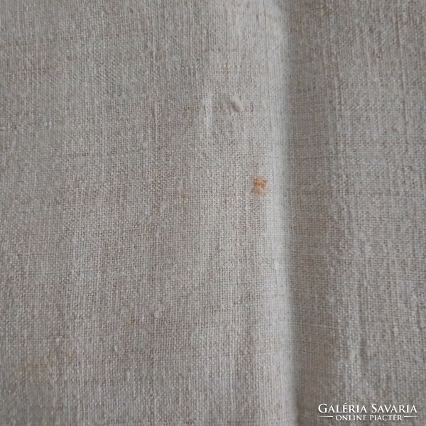 Old, thick, strong linen tablecloth. Rustic decoration.
