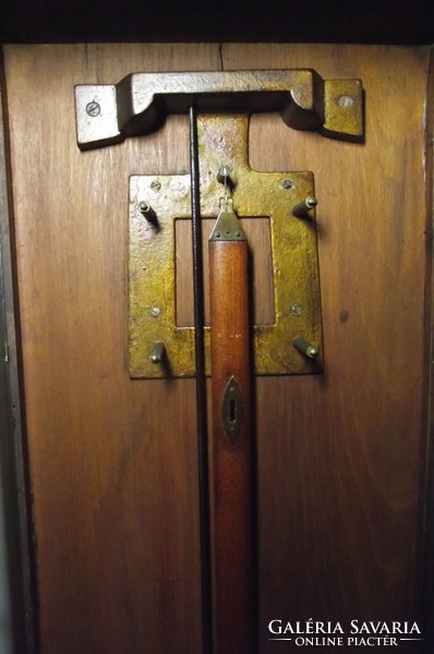 Art Nouveau, chiseled, two-weight wall clock.