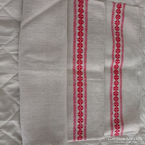 Old, thick, strong linen tablecloth. Rustic decoration.