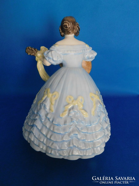 Herend antique blue dress with a large yellow bow