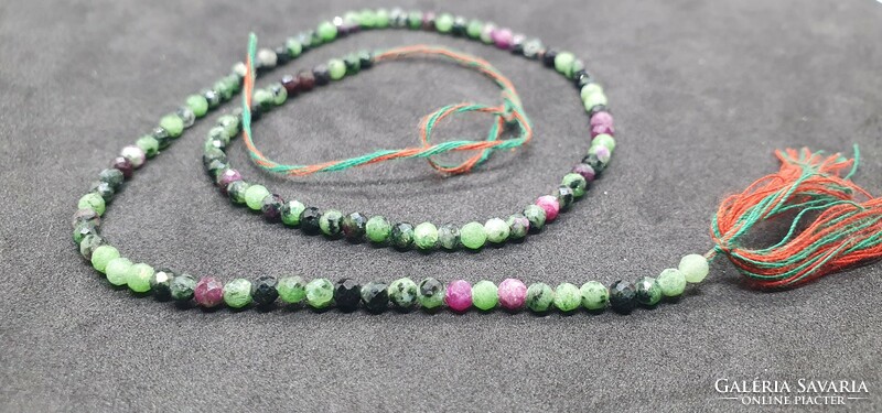 Zoisite ruby pearl row 23 carats. With certification.