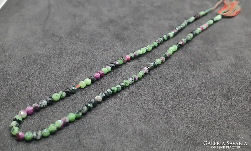 Zoisite ruby pearl row 23 carats. With certification.