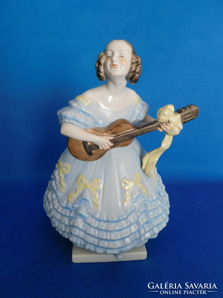 Herend antique blue dress with a large yellow bow