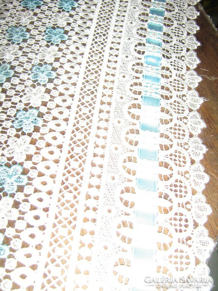 Beautiful vintage floral pattern with fringed lace tablecloth