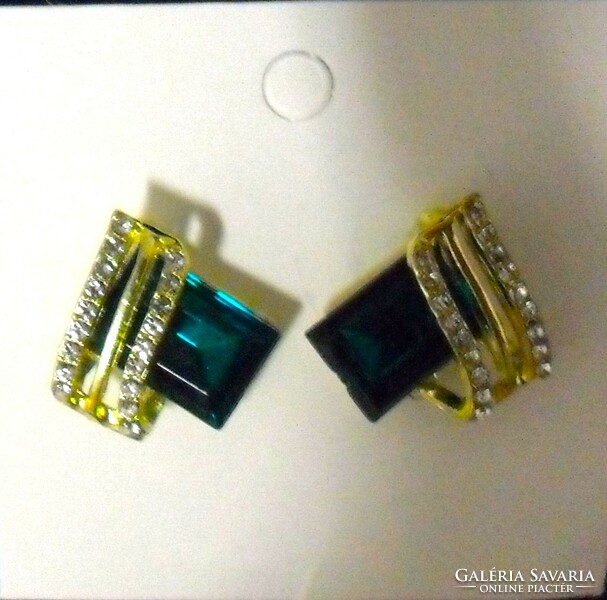 Gold-colored earrings decorated with green zirconia stones.