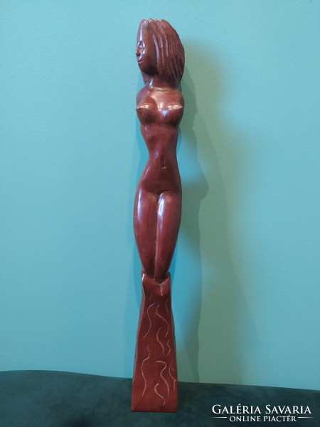 Female wooden sculpture.