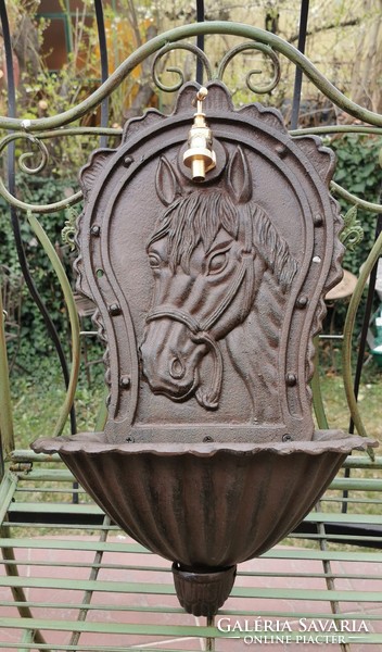 Cast iron equestrian wall well