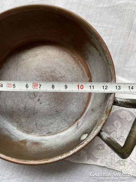 Old two-handled copper vessel, frying pan