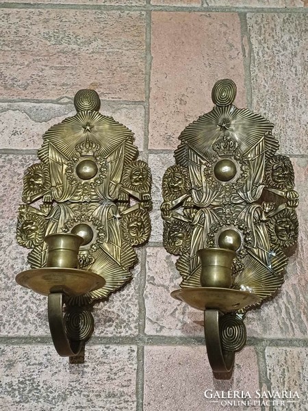 A pair of old coat-of-arms-lion wall sconces
