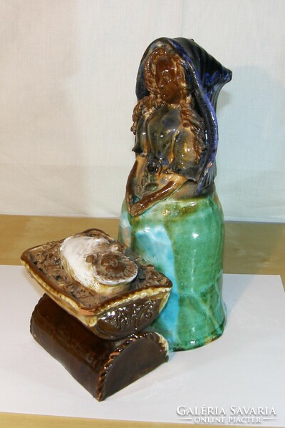 Glazed ceramic figurine of a mother with her child