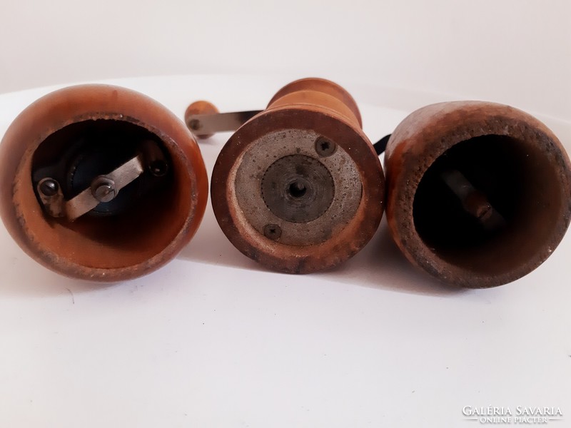 Old wooden pepper mills in a package