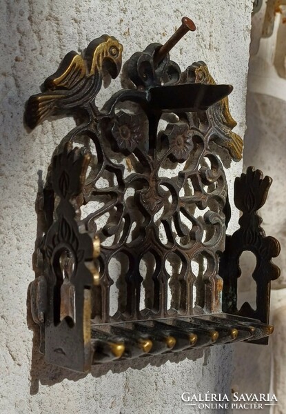 Antique wall Hanukkah. Judaica, Hanukkah oil lamp, oil candle, menorah.
