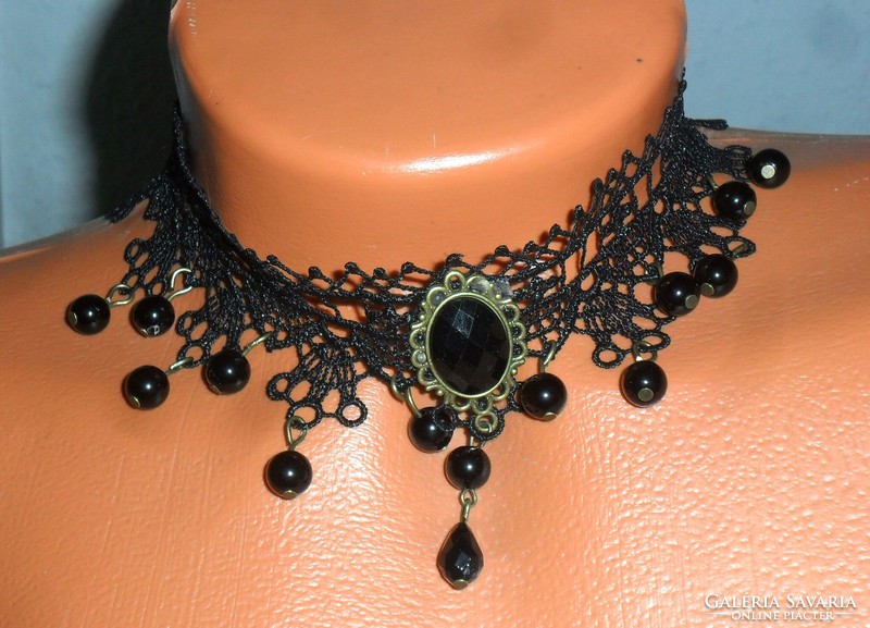 Gothic style collar made of blue black lace, decorated with pendants, glass drops and pearls. Adjustable.