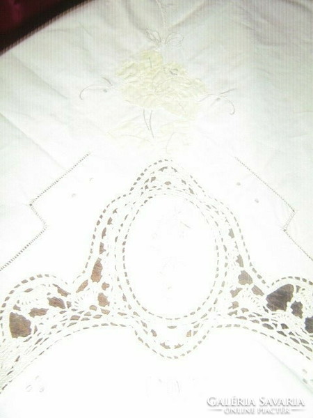 Beautiful hand-crocheted corner and inset sewn yellow rose ecru tablecloth