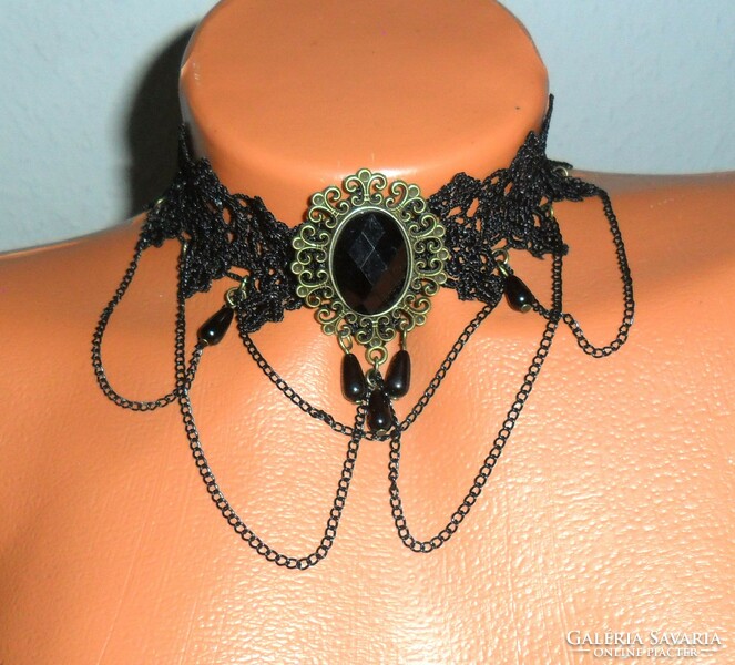 Gothic style collar made of blue black lace, decorated with a stone pendant, glass drop, and chain. Adjustable.