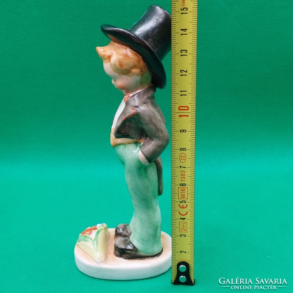 Industrial ceramic boy figure with a cylinder