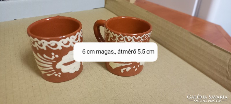 2 ceramic coffee cups with a folk pattern