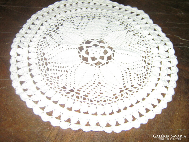 Cute hand crocheted white round tablecloth