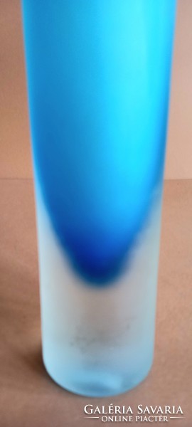 A marked Murano glass vase is negotiable.