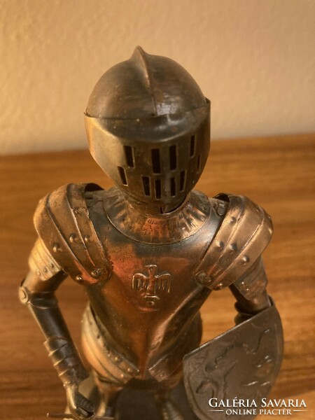 Knight's armor made of miniature red copper plate