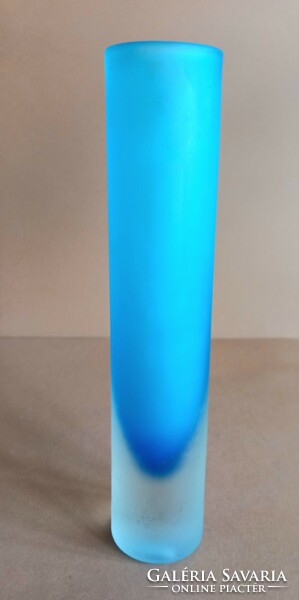 A marked Murano glass vase is negotiable.