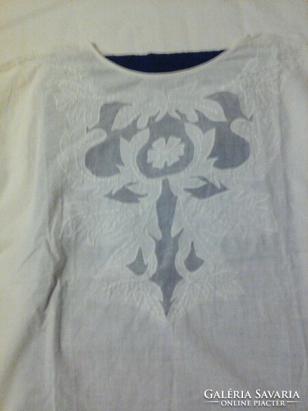 White sleeveless vintage blouse with lace and embroidery on thin cotton canvas