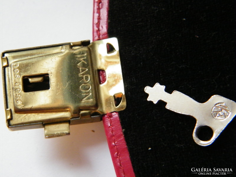 Vintage bambino key in leather jewelry case
