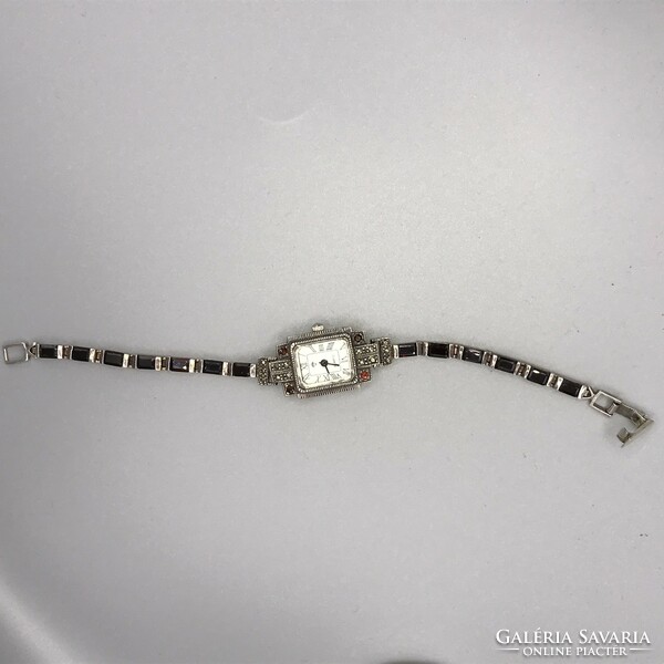 Art deco style silver bracelet watch decorated with garnet stones and marcasite marked 925.