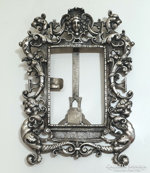 Silver-plated copper picture frame with cherub decorations from the end of the 19th century