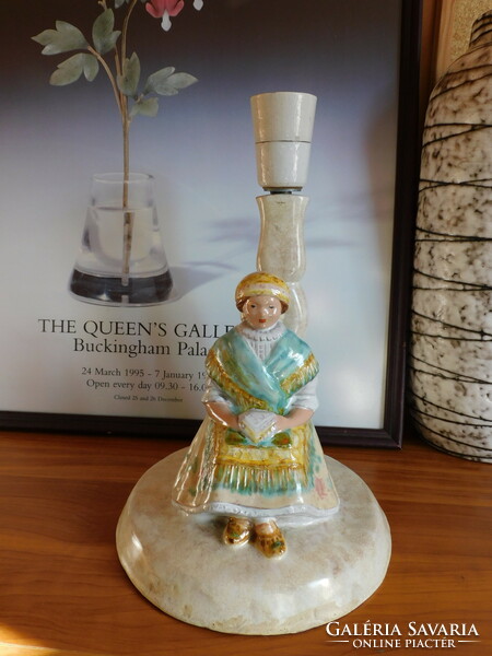 Vintage ceramic lamp with a girl dressed in folk costume