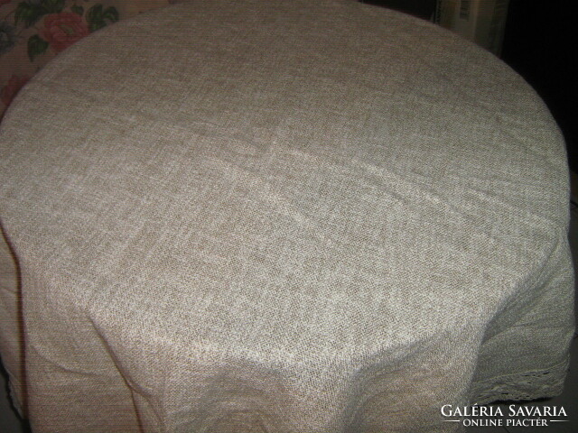 Beautiful woven tablecloth with white lacy edges