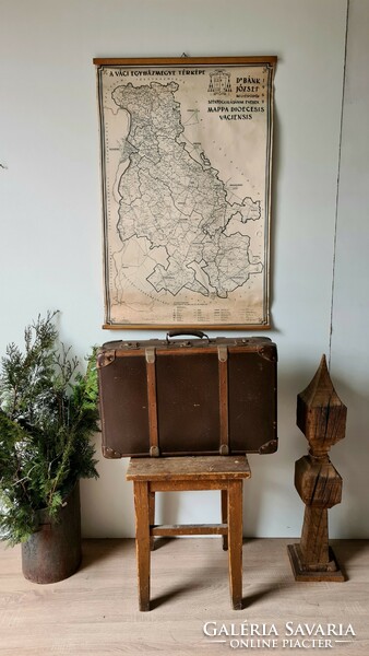 Old suitcase with wooden overlay