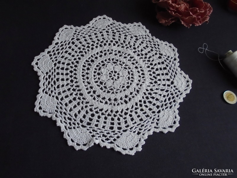 25 cm diam. Decorative tablecloth crocheted from snow-white, soft cotton thread.