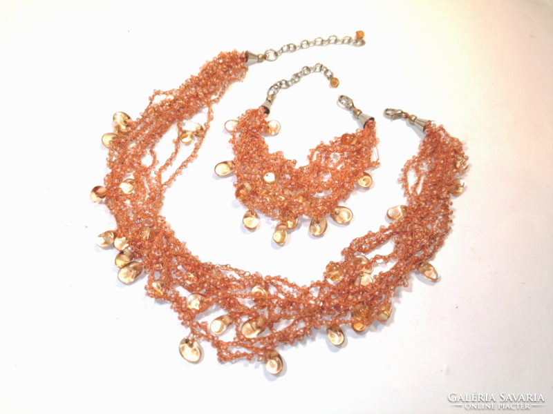 Salmon colored glass bead collection (1129)