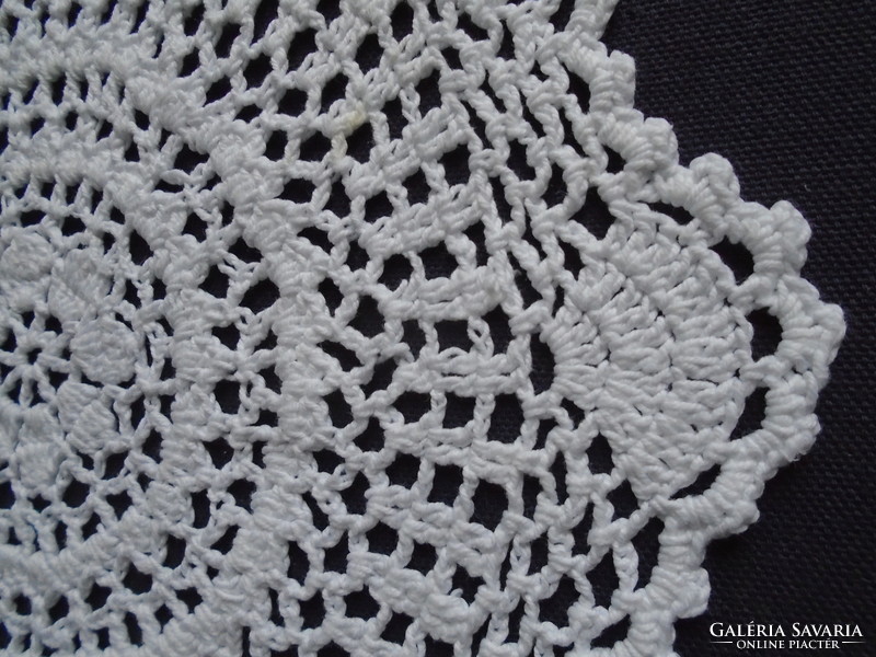 25 cm diam. Decorative tablecloth crocheted from snow-white, soft cotton thread.