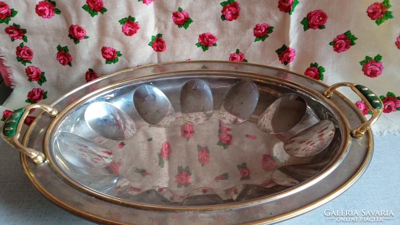 Silver colored metal serving bowl with golden frame