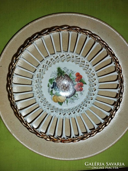 Porcelain, round fruit bowl with pierced edges