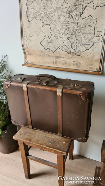 Old suitcase with wooden overlay