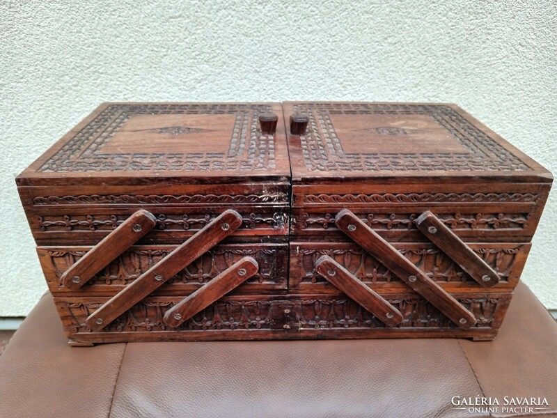 Antique carved openable sewing box. Negotiable.