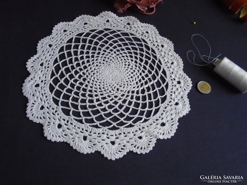 28 cm diam. Tablecloth crocheted from soft, thicker cotton yarn.