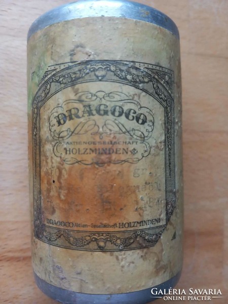 Dragoco wood and metal bottles