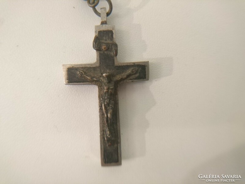 Old antique rosary, reader, crucifix in a carved wooden box